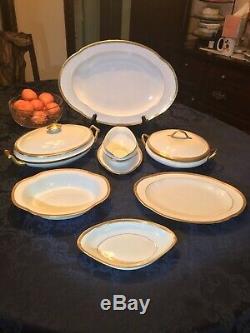 A. Lanternier Limoges white dinnerware set with gold trimvery good condition