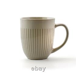 Elama Market Finds 16 Piece Round Stoneware Dinnerware Set in Embossed White