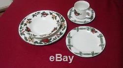 Holiday/Country-style dinnerware set (8 place settings). Apple & cherry design