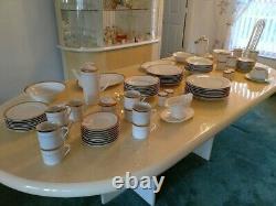 New Traditions dinnerware set, service for 16 White with gold encrusted scroll