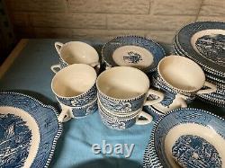 Royal China Currier and Ives 8-10 place dinnerware set blue an white