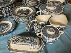 Royal China Currier and Ives 8-10 place dinnerware set blue an white