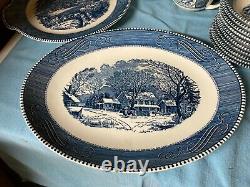 Royal China Currier and Ives 8-10 place dinnerware set blue an white