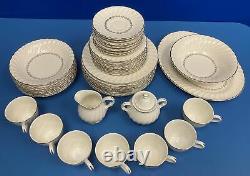 Sheffield 42 Piece Bone White Dinnerware Set With Silver Rim & Floral Pattern
