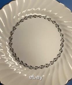 Sheffield 42 Piece Bone White Dinnerware Set With Silver Rim & Floral Pattern