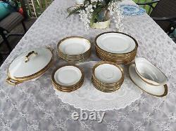 Two Limoges Dinnerware Set With Similar Golden Encrusted Trim 47 Pc